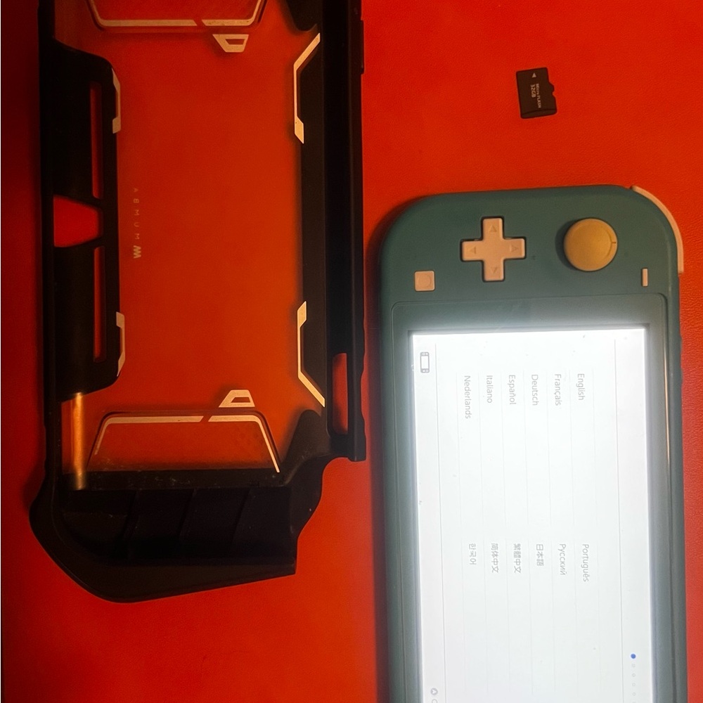 Nintendo Switch Lite in Teal with Accessories
